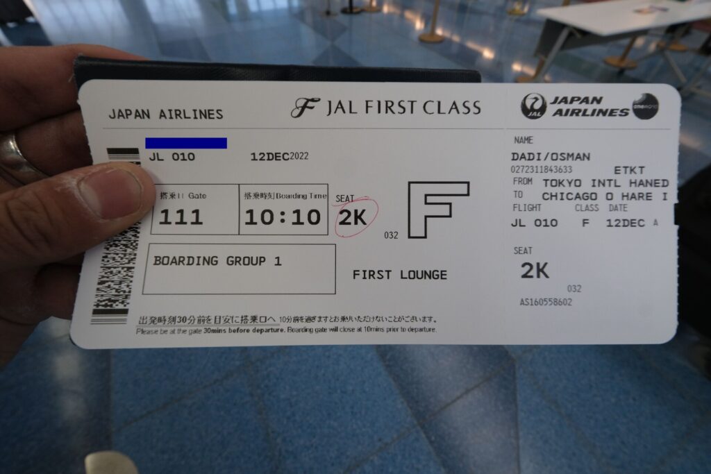 JAL first class boarding card