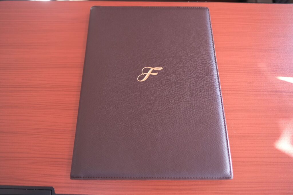 JAL First Class Leather Menu Cover.
