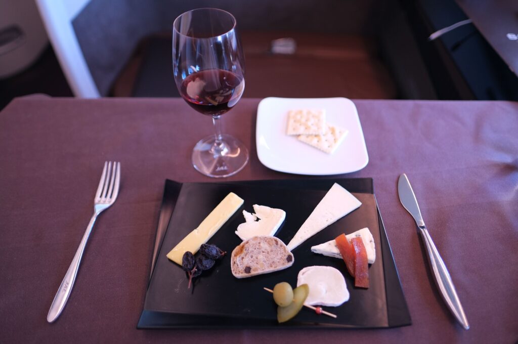 JAL First Class Cheese plate with Japanese Gouda Cheese on the right side.
