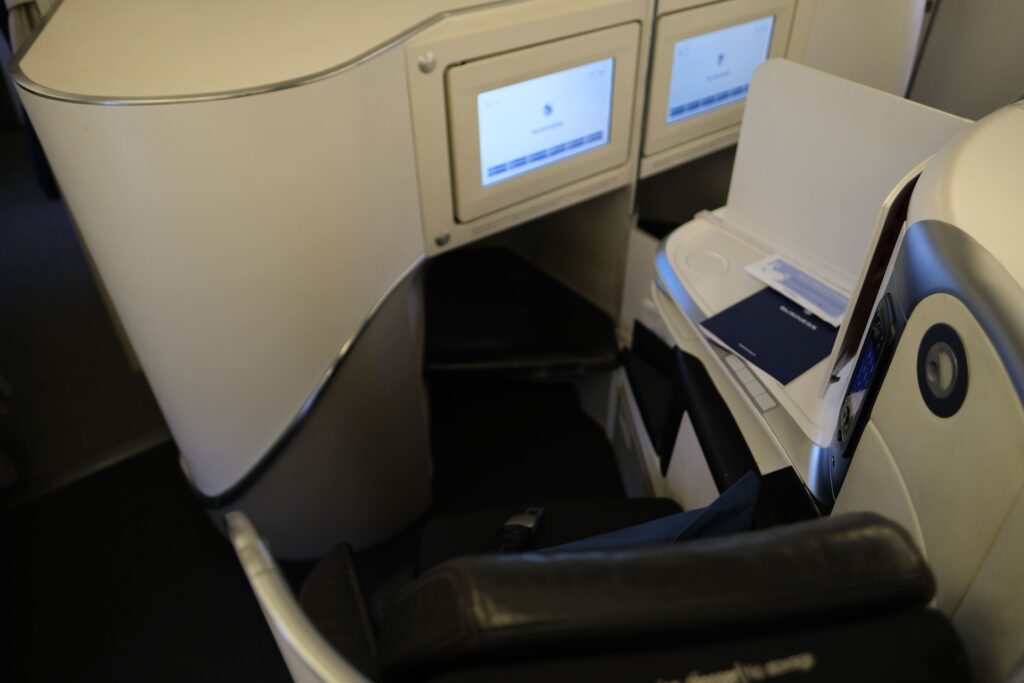 Views of Seat 3E, including the wide footwell.  