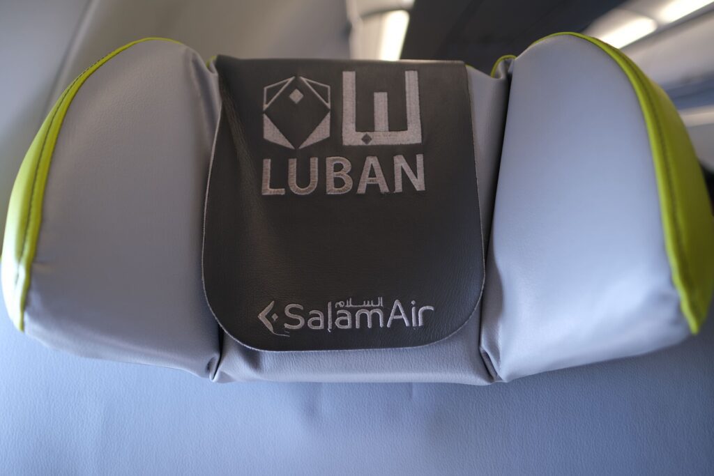 Each Salam Air Luban Class seat is equipped with this comfortable folding headrest with the Salam Air logo on it. 