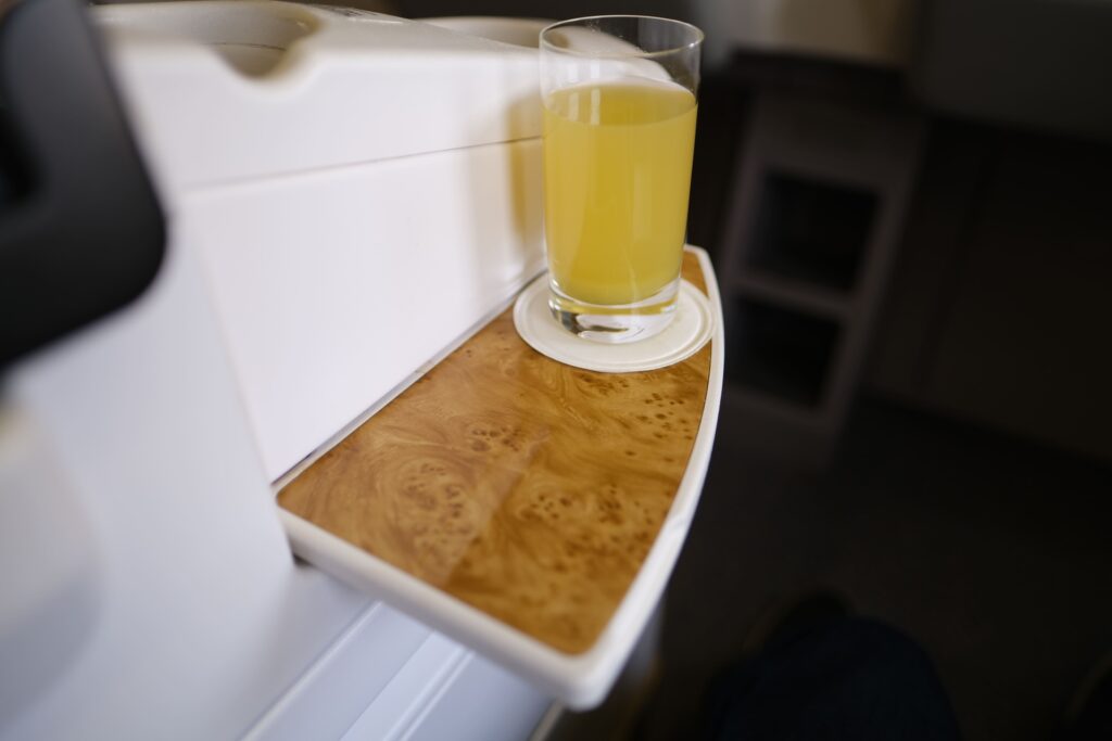 I Utilized the folding table for the preflight “vitality boost” juice drink.
