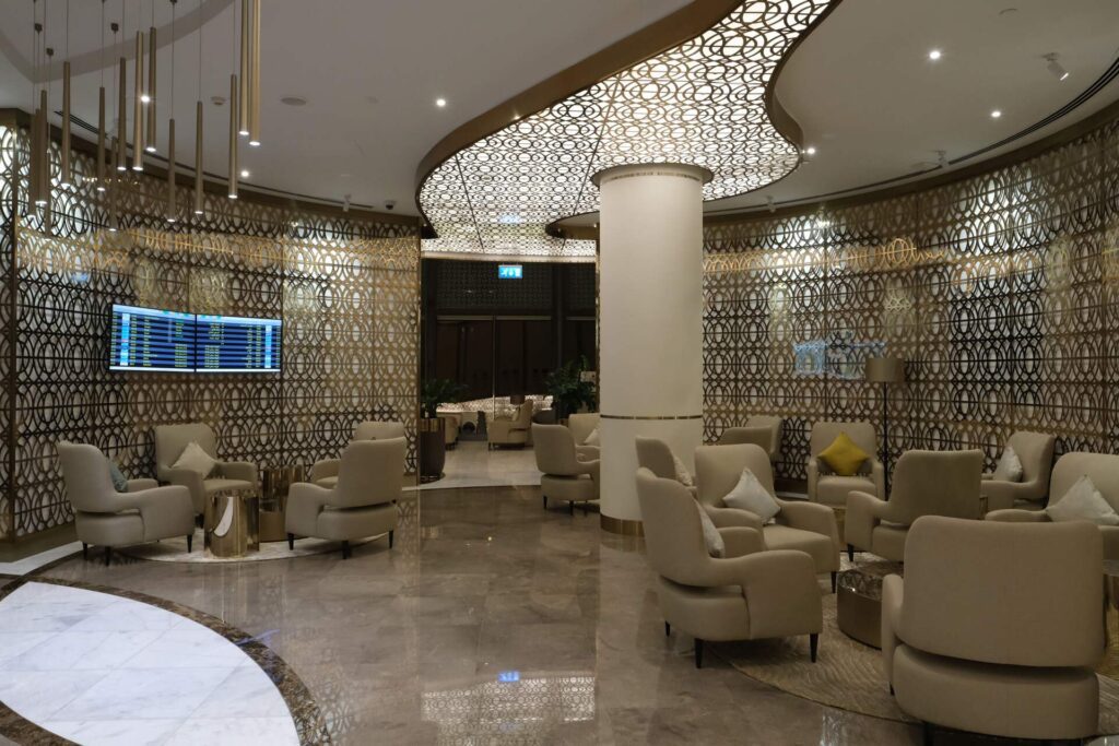 Main Oman Air First Class lounge areas with departure boards