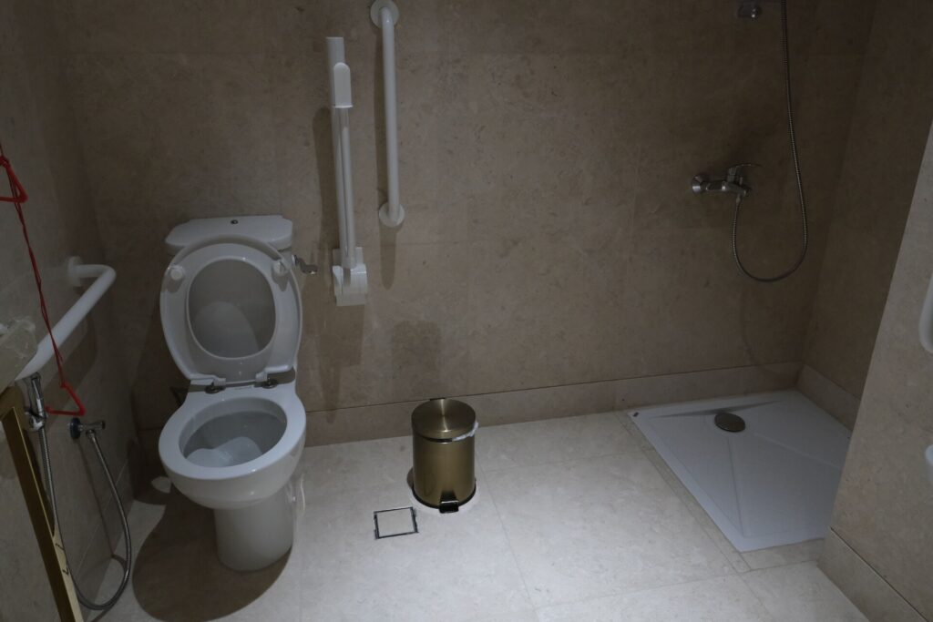 Shower and Toilet is simple and very spacious. 