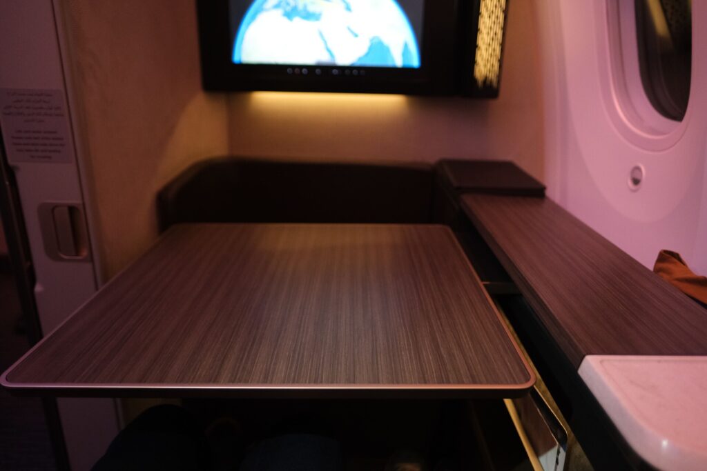 Oman Air First Class seats are equipped with a large table - this pops out from the side of the seat.