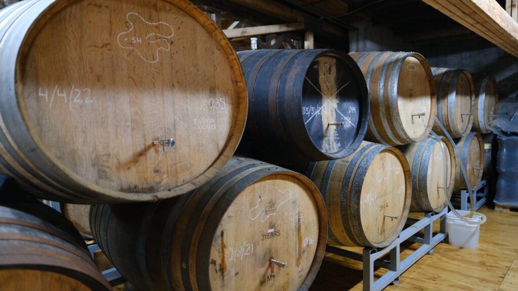 Fermented beers stored on French Oak Barrels on their brew space.  