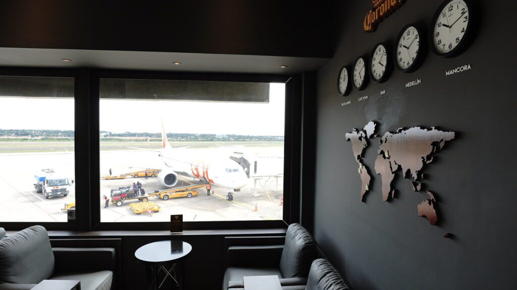Great view of the gate, apron and runway for the lounge window