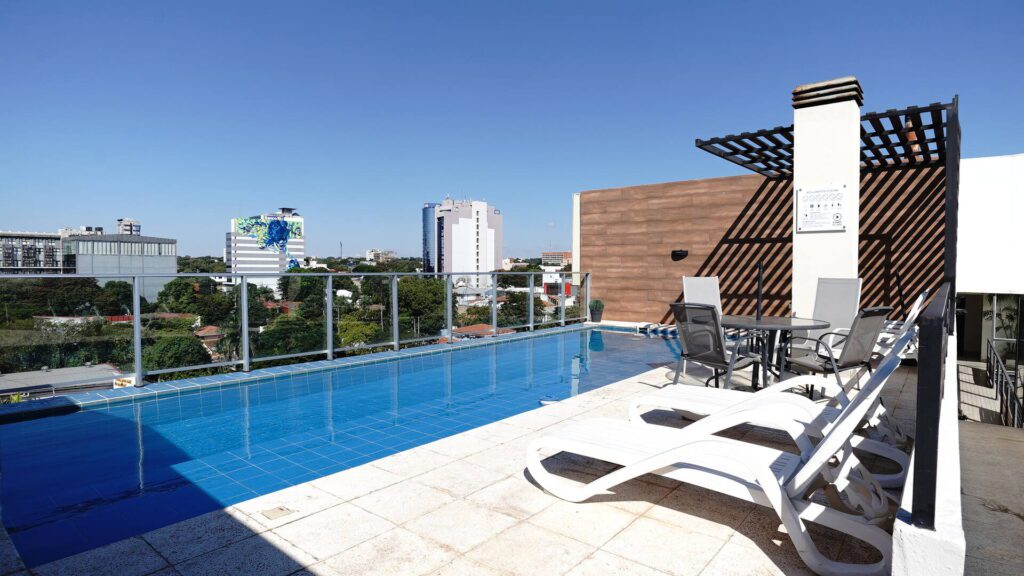 Rooftop swimming pool, with a grand view of Asuncion