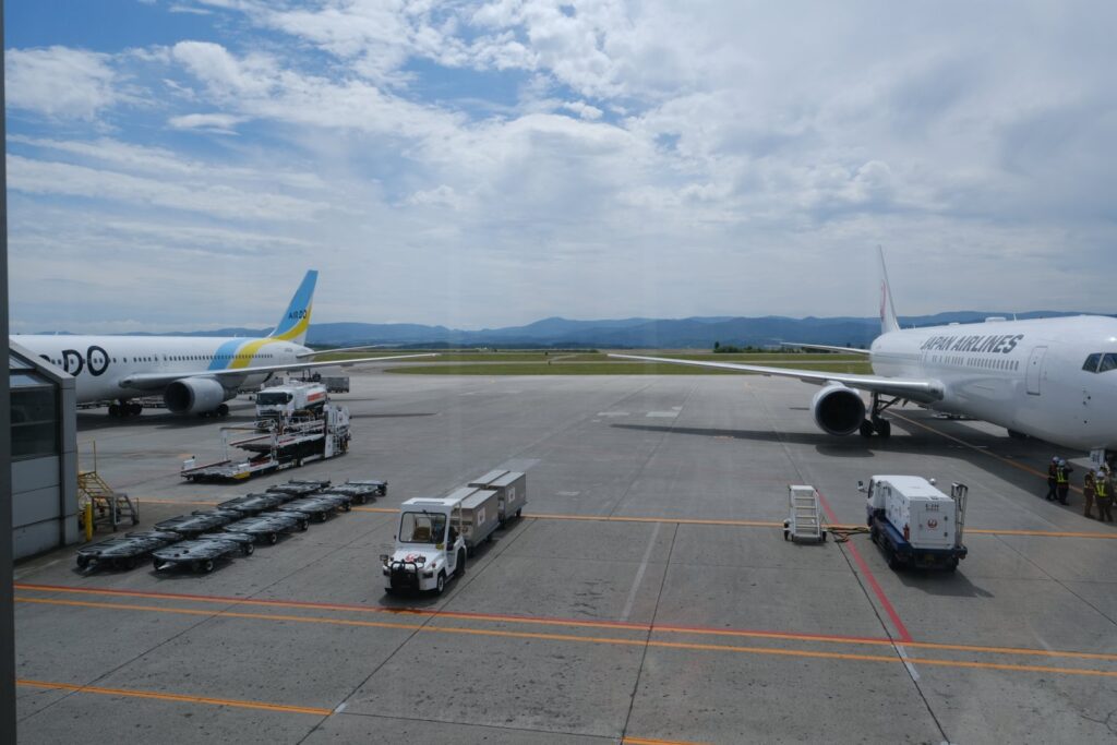Two B767-300s at Asahikawa AKJ airport, Air DO on the left and Japan Airlines on the right