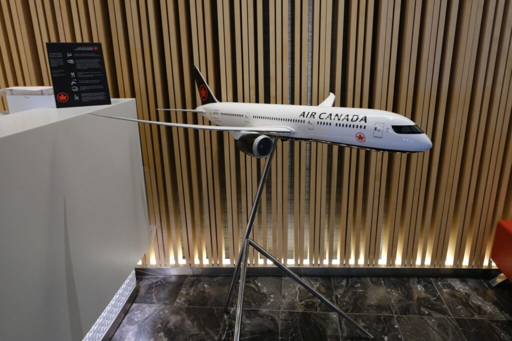 Air Canada B787 model in the Maple Leaf lounge entrance