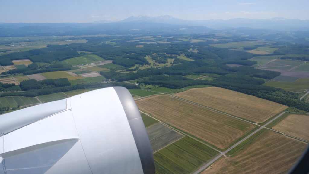 Taking off to views of Furano and the mountains at Asahikawa