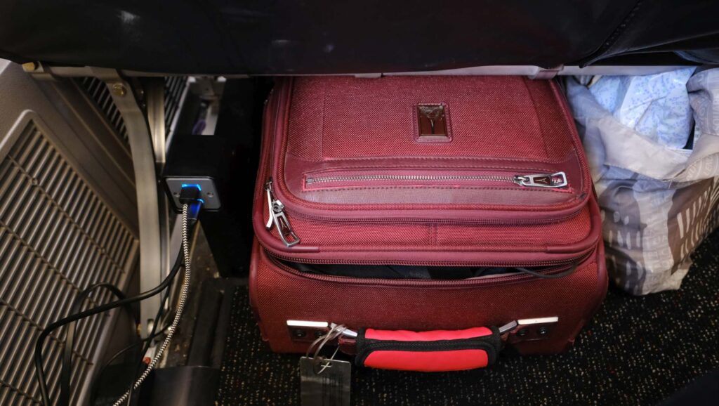 Ample storge space under the seat, with USB ports on the left