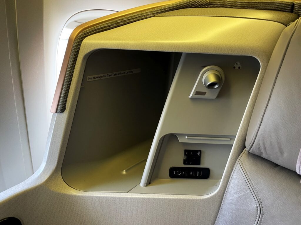 The window side of the seat includes a panel cover, with power port, USB, headphone and S-Video connection ports