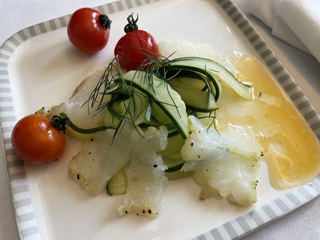 Close up of the Marinated Cod with Cucumber Salad