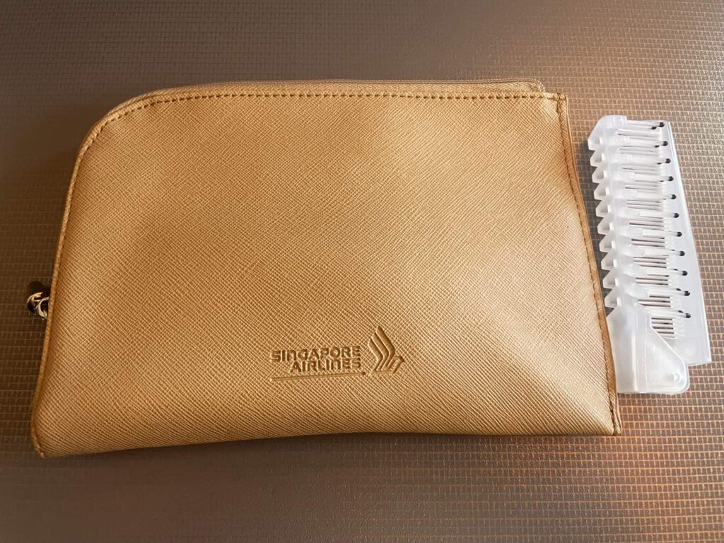 The Singapore Airlines Amenity kit with folding comb and brush