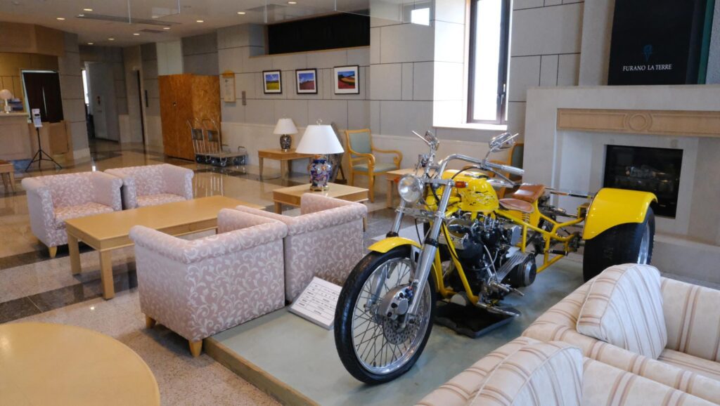 The motorcycle, in the lobby, check In area behind