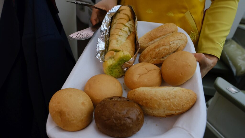 Rolls and absolutely delicious garlic bread were offered on the main service. 