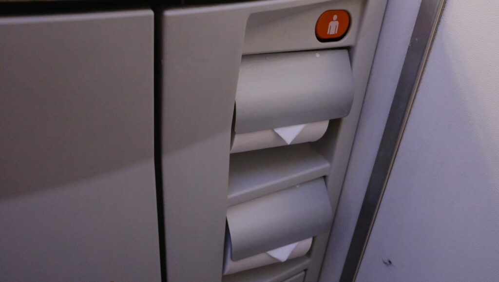Toilet paper dispenser refreshed mid-flight
