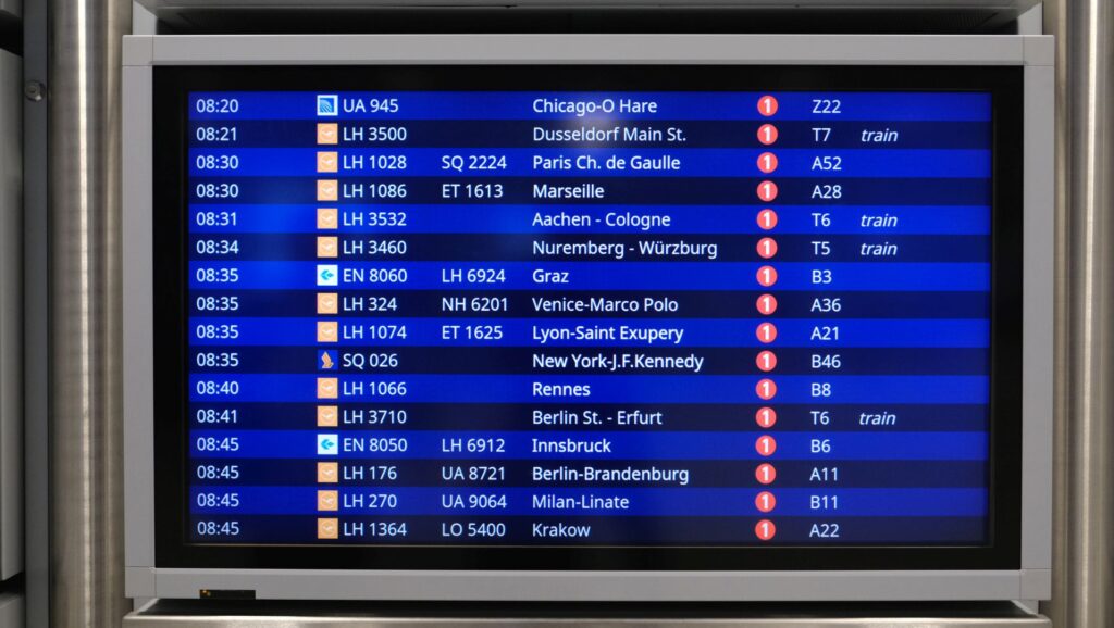 The departure board displaying my next flight leaving form Gate B46