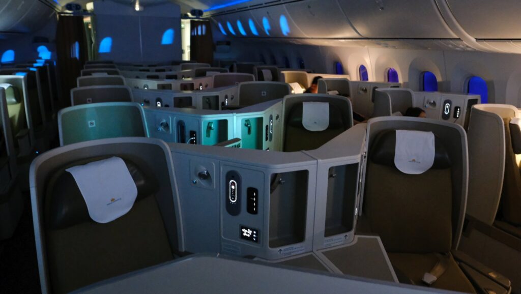 Center view of Vietnam Airlines Cabin interior with a blue hue