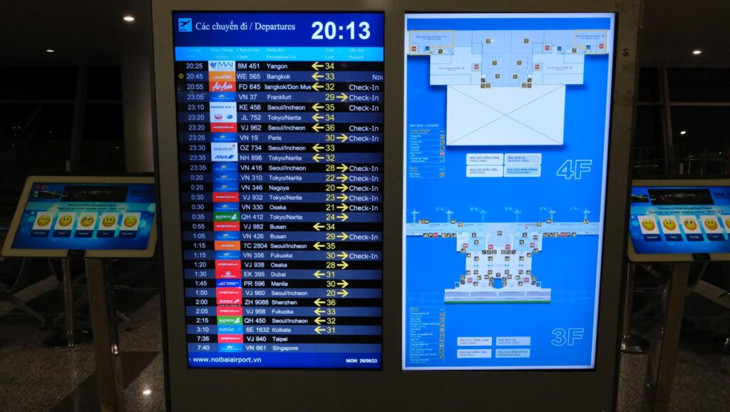 Map and departures board - my flight is fourth on the list after a two hour break