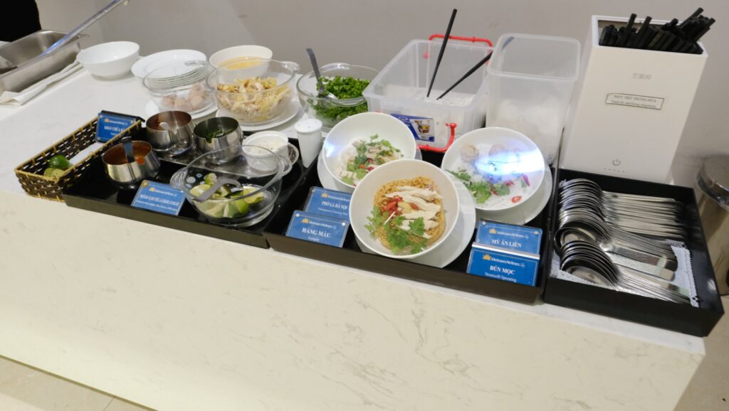 Cutlery and a selection of condiments, and light salads