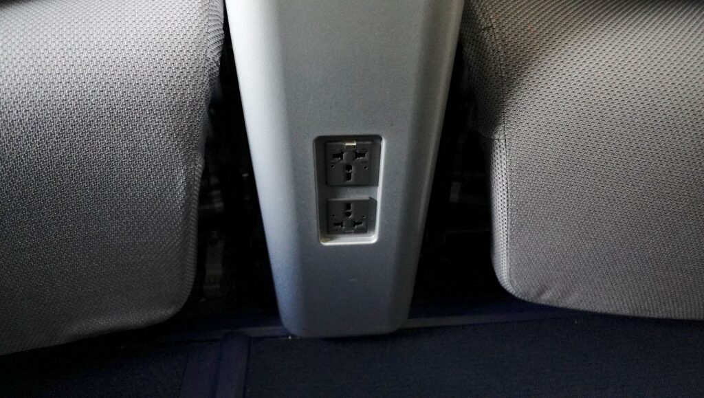 Power ports in front of the seat
