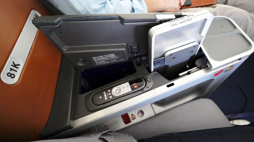 The tray table pops out of the center console