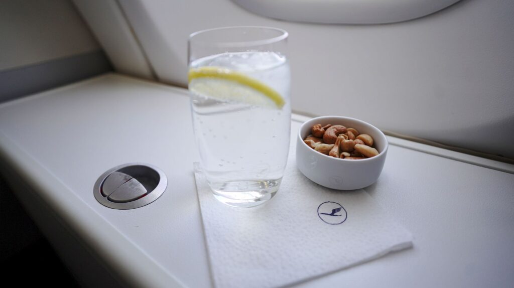 Warm nuts and water served after departure