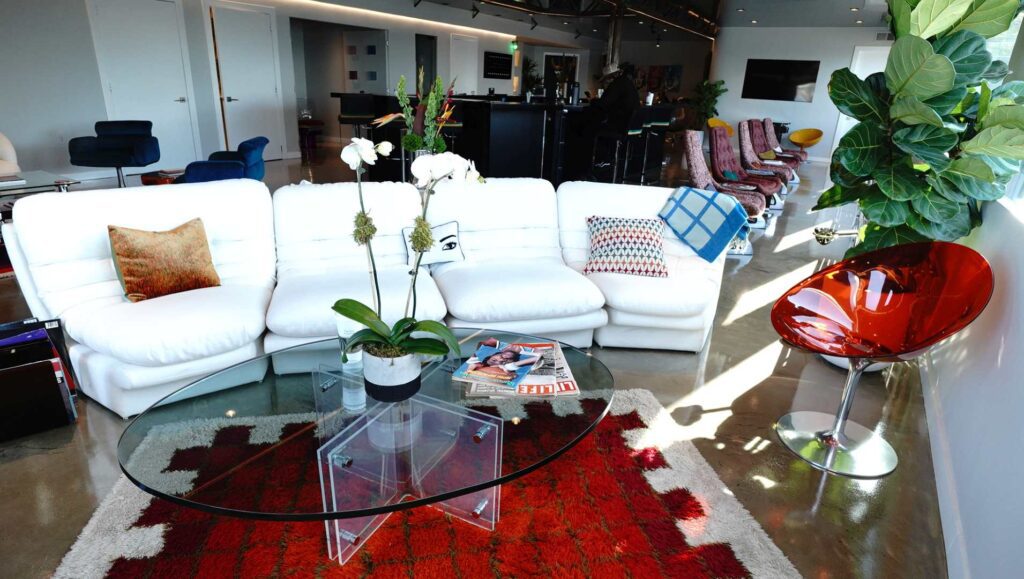 The attractive sectional sofa looks onto the Hudson and the Heliport