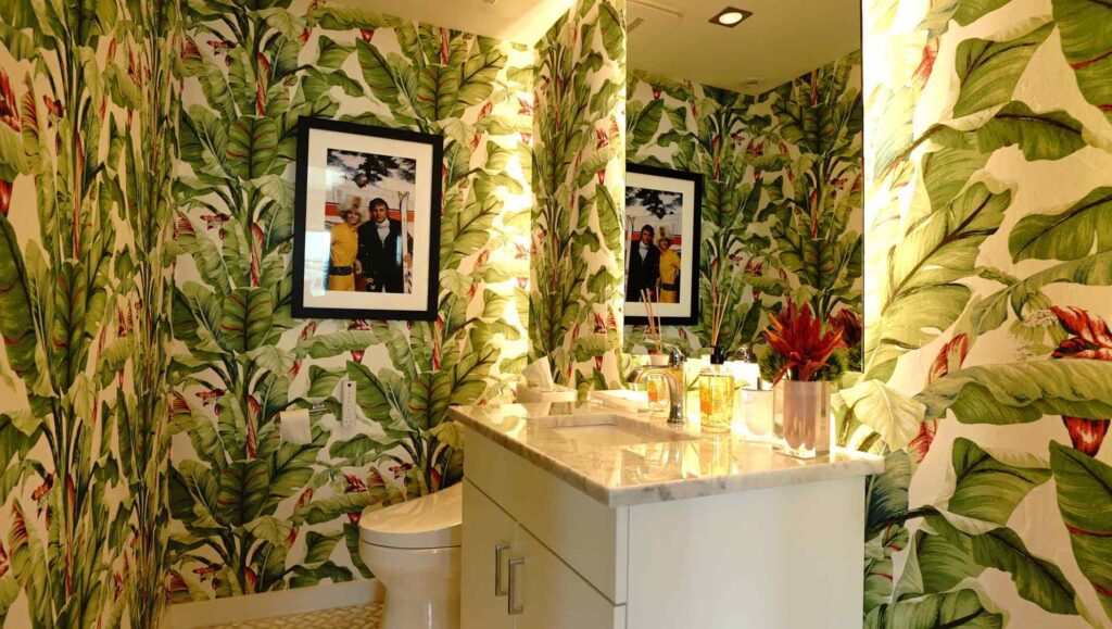 Inside the colorful floral BLADE lounge restrooms