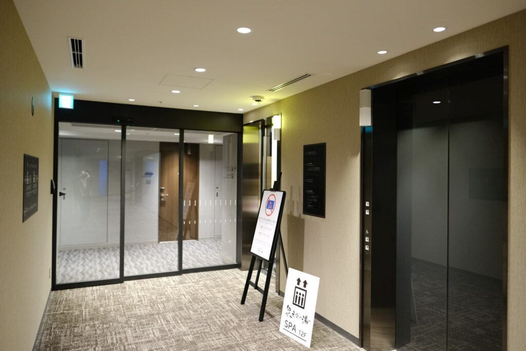 The Onsen is on the top floor and can be used by guests of either hotel