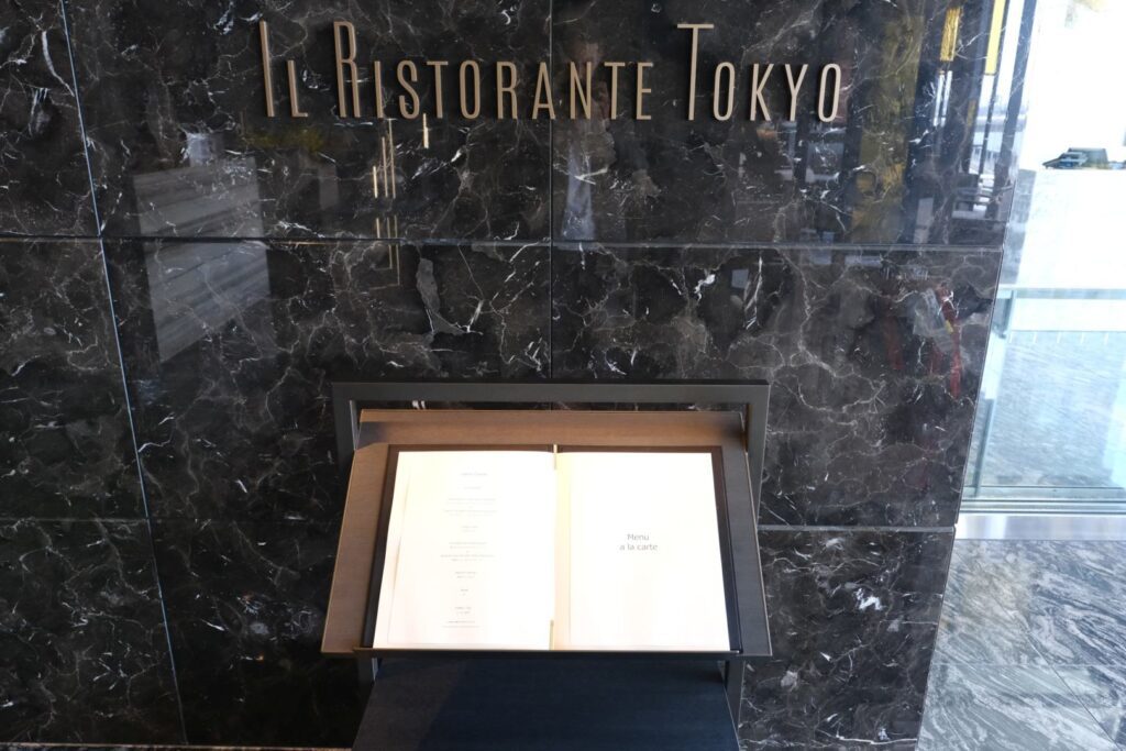 The outside of the “Il Ristorante Tokyo” with the menu on display