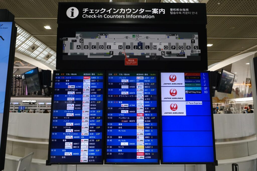 Finding my flight on the Japanese language departure board was fun